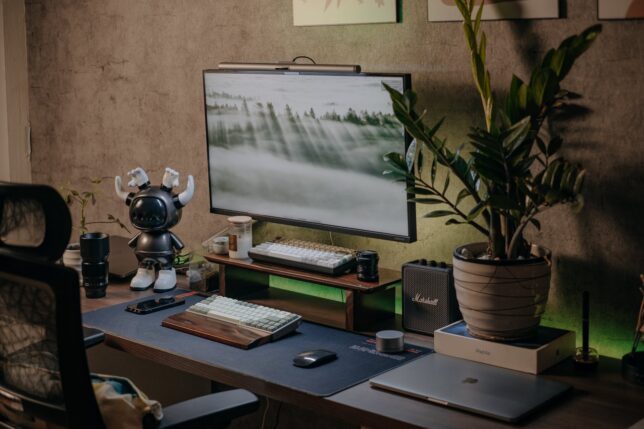 computer on a desk in a bedroom